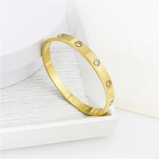 Jewlena Golden Cross Bangle Classic Stainless Steel Bracelet