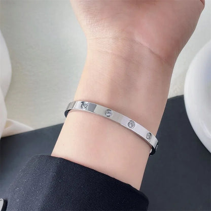Jewlena Golden Cross Bangle Classic Stainless Steel Bracelet